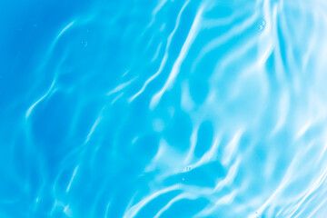 Blue water surface,Transparent blue clear water surface texture with ripples, splashes and bubbles....