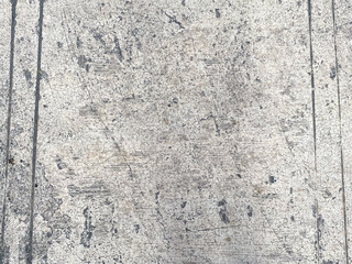 Fototapeta premium The grunge texture of the concrete background adds a touch of edginess.