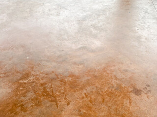 The rough surface of the concrete creates an interesting visual pattern.