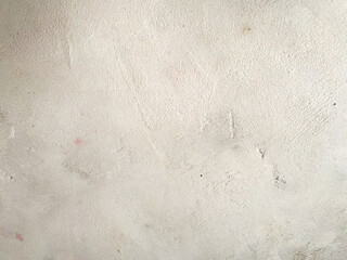 A textured wall in shades of gray, offering a neutral and sophisticated aesthetic.