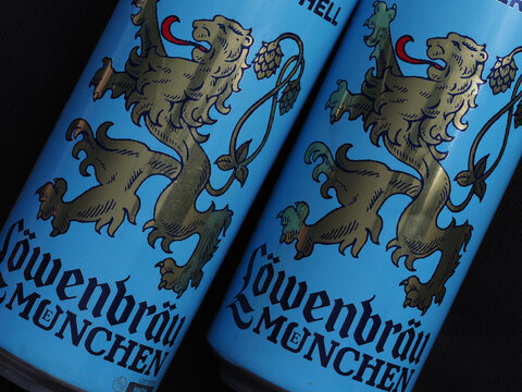 In this photo illustration an Munchner Hell Lowenbrau Munhen beer  produced by Lowenbrau AG brevery