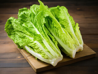 Fresh romaine lettuce on a wooden tray, fresh vegetables ready to be cooked