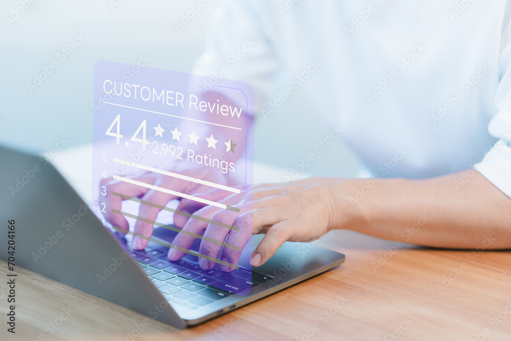 Fototapete customer using a computer laptop give ratings and point 4.4 stars icon for feedback review satisfact