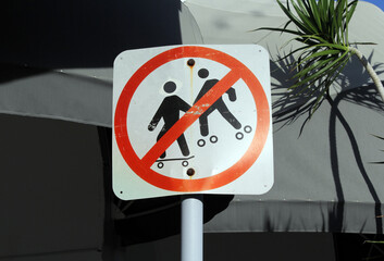 No skateboards or roller blades skates road sign