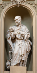 Fototapeta na wymiar VICENZA, ITALY - NOVEMBER 6, 2023: The statue of St. Giuseppe in the church Chiesa di San Gaetano by unknown artist.