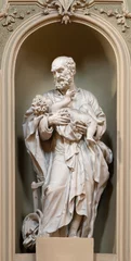 Deurstickers VICENZA, ITALY - NOVEMBER 6, 2023: The statue of St. Giuseppe in the church Chiesa di San Gaetano by unknown artist. © Renáta Sedmáková