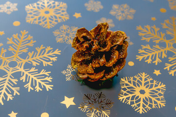 Decorative pine cone on a napkin close-up