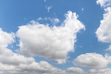 The unique  beauty of a clear cloudy daytime summer sunny calm bright sky