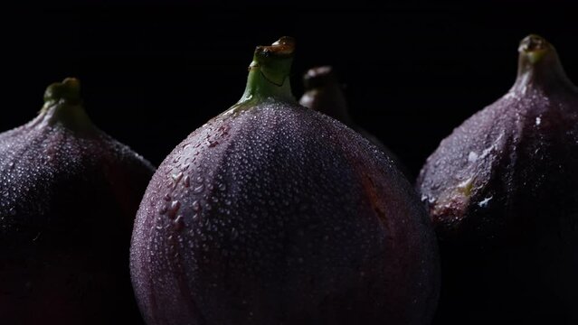 Fresh fig with a dark background.