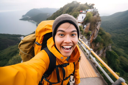 Happy traveller Asian man with backpack taking selfie picture - Travel blogger Life style and technology concept