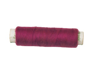One whole sewing thread spool isolated on a white background.png