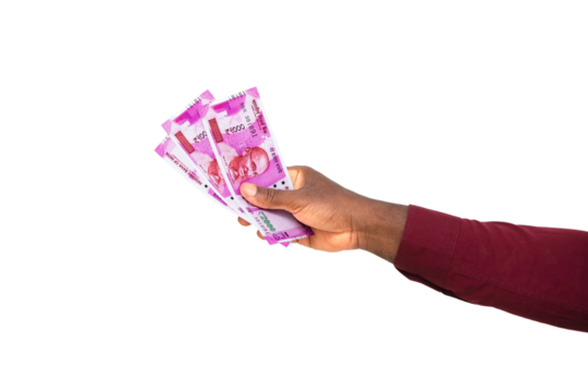 Black hand holding Indian rupee notes, currency of India with person