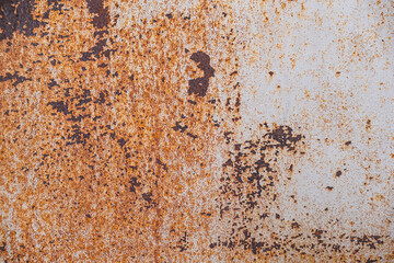 rusty and dirty metal surface with peeling paint.