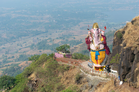 Picture of Lord Ganesha's Idol 
made of Rock near Matheran, Maharashtra. Hinduism, sanatan economics, sanatan, India, Indian, Ganesh Chaturthi, pilgrimage, spiritual, religious, people, peace, nature