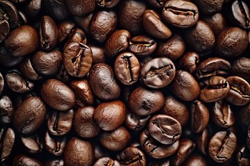 Fototapeta premium Energetic macro view of dark coffee beans forming beautiful background with mocha undertones representing aromatic awakening of breakfast energies in gourmet coffee composition