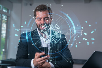 Smiling businessman talking holding using smartphone typing at office workplace with notebook....