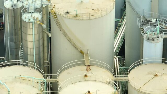 The aerial perspective unveils the lubricant plant as a complex technical tapestry, where engineering and chemistry seamlessly merge to produce vital lubricants.
