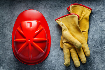 Construction Tools Red Helmet And Yellow Gloves.