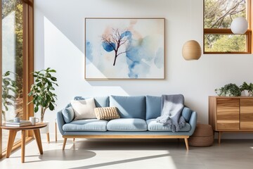 Blue sofa in a living room with a tree painting