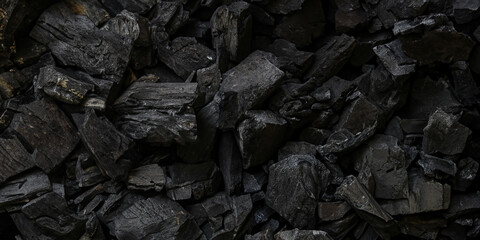 black coal background. charcoal woody black.  lot of wood - obrazy, fototapety, plakaty