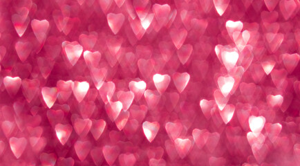 Pink hearts, sparkling bokeh, abstract defocused background for Valentine's Day