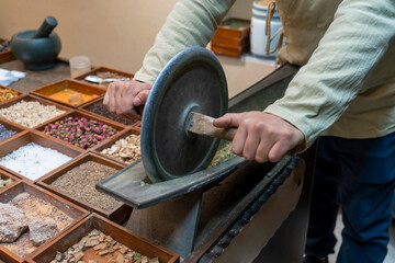 Traditional Chinese Medicine is grinding aromatherapy herbs