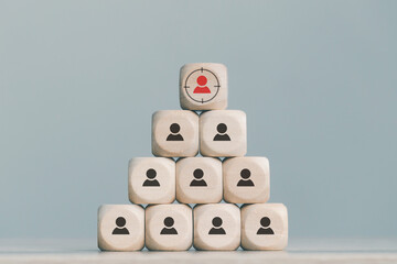 wood cube block with Organizational leader working as a team