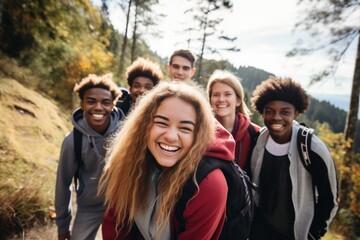 Group of diverse friends hiking in the mountains