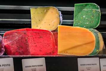Selection of gourmet Gouda cheeses at an artisanal cheese maker shop in the Carre d Or historical...