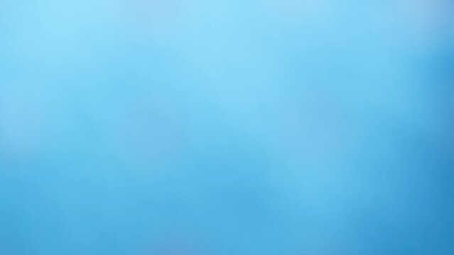 Abstract animated blue background with slight shimmer and gradient.