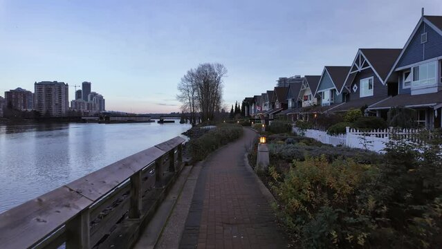 Scenic Suburban Path by Water. Winter Season, Sunset. Vancouver, New Westminster, BC Canada.