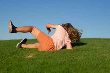 Kid runs and falling down. Moment of the kid fall down. Little child tripped and falls down. Fall...