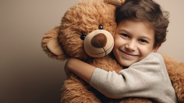  a little girl hugging a teddy bear with her arms wrapped around her chest and smiling at the camera with a smile on her face.