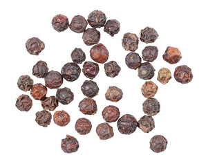 Seeds or pile of black pepper, Indian spice, isolated on white background.
