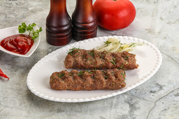 Kebab with beef served onion