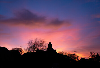 Fototapeta premium time lapse of sunrise, sunset church in small village