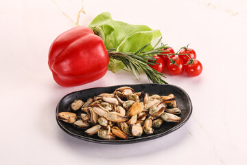 Marinated mussels in the bowl
