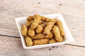Raw ripe unpeeled peanut heap