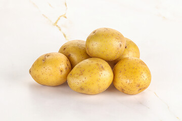 Raw young baby potato heap