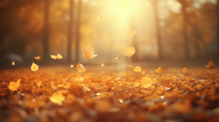 Leaves fly in wind in sunlight. Concept of Golden