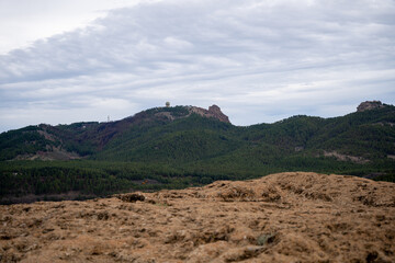 Landscape view of green observatory from Roque Nublo volcanic rock on the island of Gran Canaria, Spain