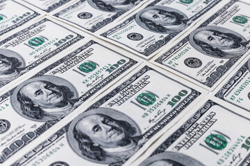 Top view of one hundred dollar bills.