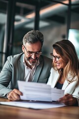 Two happy smiling professional executives discussing financial accounting papers working together in office. Mature business woman and man managers holding legal documents at meeting, Generative AI 