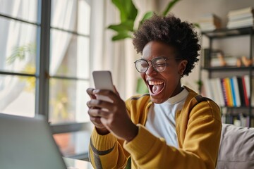 Young happy African American teen student feeling excited winner holding cellphone using mobile phone winning online, receiving great news on smartphone getting reward celebrating, Generative AI  - obrazy, fototapety, plakaty