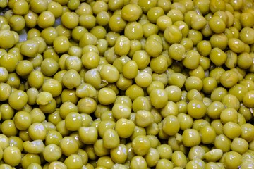 lots of canned green peas. A large quantity.