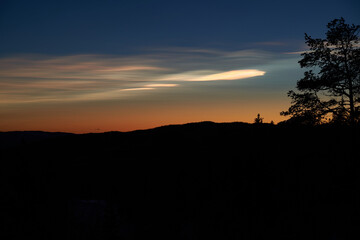 Pearl clouds on the evening sky above Krøderen Lake, Norway