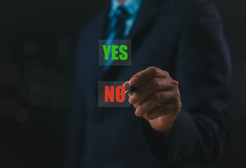 A businessman is deciding between a symbol that is right or wrong, true or false, yes or no. for...