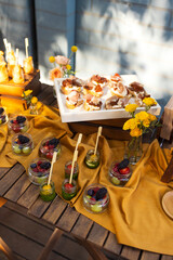 Backyard barbeque party at summer, elegant decoration, luxury catering