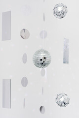 Mirror glass disco ball on gray background