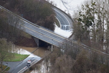 Rhine flood on a county road with the main road above clear
